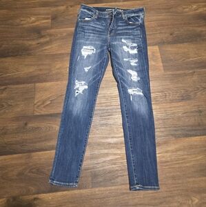 American Eagle Next Level Stretch Jegging Size 12 regular. Distressed Dark Wash